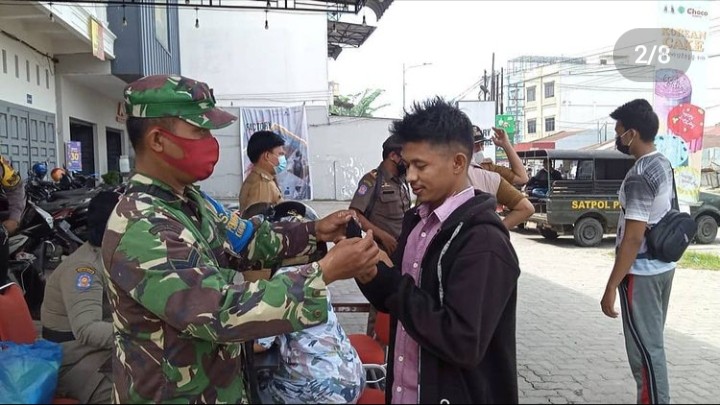 Pelaksanaan Himbauan penindakan disiplin dan penegakkan prokes pengendalian Covid 19 di Wilayah Kecamatan Medan Marelan